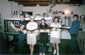 Ladies Holding a Snake